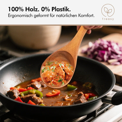 Treasy Kochlöffel aus Akazienholz rührt ein Schmorgericht mit Fleisch und Paprika in einer beschichteten Pfanne
